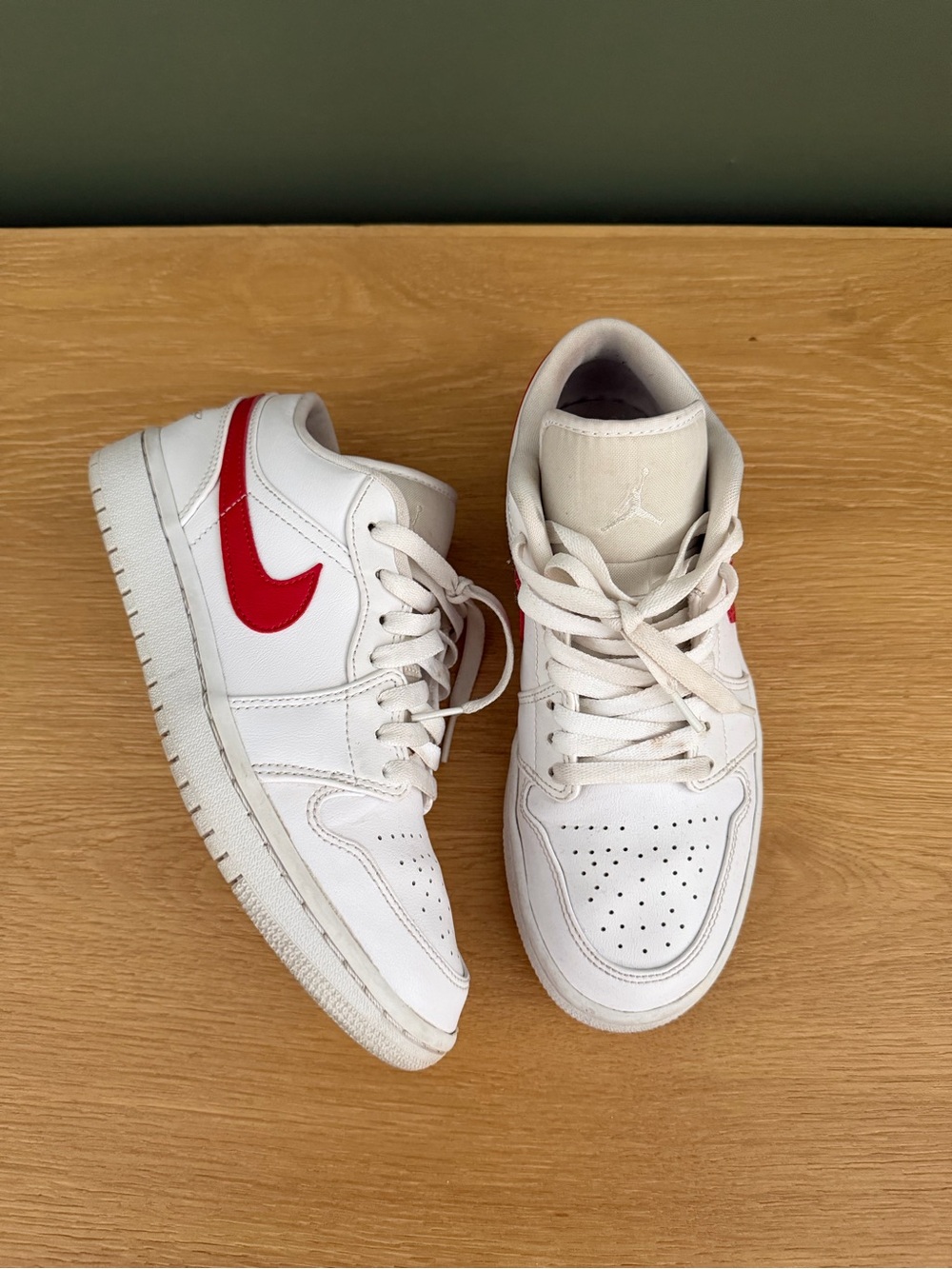 Nike Kids White Sneakers with Red Swoosh Accent